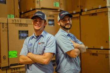 Two technicians from Colony Air Conditioning & Heating - Call today for HVAC service in Frisco