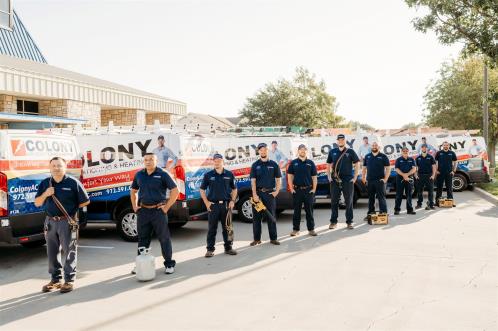 Photo of Colony's technicians with their trucks in Frisco
